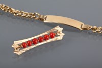 Lot 1262 - EIGHTEEN CARAT GOLD CORAL SET BROOCH along...