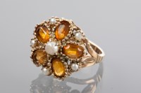 Lot 1268 - CITRINE AND PEARL DRESS RING in the form of a...