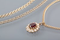 Lot 1269 - NINE CARAT GOLD GARNET AND PEARL PENDANT along...