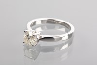 Lot 1270A - DIAMOND SOLITAIRE RING the brilliant cut stone...