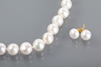 Lot 1271 - CULTURED AKOYA PEARL NECKLACE formed by...