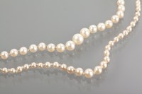 Lot 1308 - EDWARDIAN PEARL NECKLACE with a platinum and...