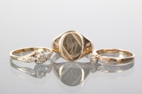 Lot 1310 - GROUP OF THREE NINE CARAT GOLD RINGS...