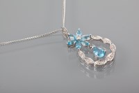 Lot 1316 - EIGHTEEN CARAT WHITE GOLD TOPAZ PENDANT set...