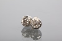 Lot 1320A - PAIR OF DIAMOND STUD EARRINGS each set with a...