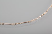 Lot 1333 - NINE CARAT GOLD NECKLACE formed by oval links...