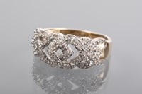 Lot 1341 - DIAMOND DRESS RING the openwork bezel formed...