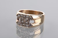 Lot 1343 - DIAMOND DRESS RING with two interlinking...