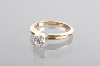 Lot 1344 - DIAMOND SOLITAIRE RING the brilliant cut stone...