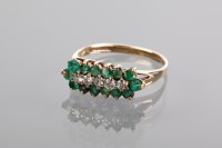 Lot 1356 - EMERALD AND DIAMOND DRESS RING set with a...