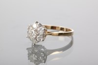 Lot 1360A - DIAMOND CLUSTER RING the brilliant cut stones...