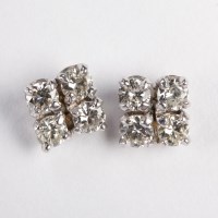 Lot 1367 - PAIR OF DIAMOND EARRINGS each set with four...