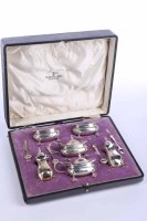 Lot 375 - GEORGE V SILVER CRUET SET maker Walker & Hall,...