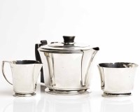 Lot 390 - ART DECO SILVER THREE PIECE TEA SERVICE maker...