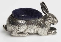 Lot 402 - EDWARDIAN NOVELTY SILVER RABBIT PIN CUSHION...