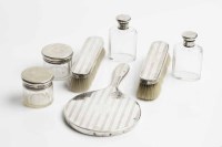 Lot 436 - EDWARDIAN SILVER PART DRESSING TABLE SET maker'...