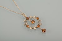 Lot 1104 - EDWARDIAN CITRINE AND PEARL PENDANT of...