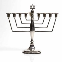 Lot 440 - SILVER EIGHT BRANCH MENORAH maker Britton,...