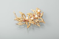 Lot 1126 - MID-TWENTIETH CENTURY RUBY AND PEARL FLORAL...