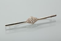 Lot 1132 - EDWARDIAN DIAMOND SET BAR BROOCH the central...