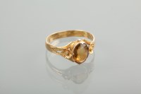 Lot 1157 - EARLY VICTORIAN CITRINE RING set with an oval...