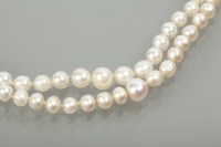 Lot 1166 - EARLY TWENTIETH CENTURY TWO STRANDED PEARL...