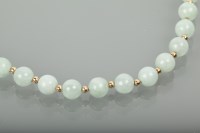 Lot 1170 - FOURTEEN CARAT GOLD JADE NECKLACE with...