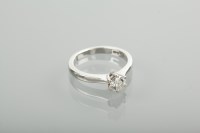 Lot 1171 - DIAMOND SOLITAIRE RING the brilliant cut stone...