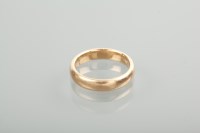 Lot 1178 - EIGHTEEN CARAT GOLD WEDDING BAND size M