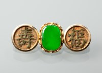 Lot 1180 - CHINESE JADE SET BROOCH set with an oval green...