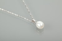 Lot 1183 - SILVER PEARL SET PENDANT the oval white pearl...