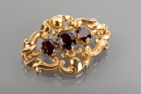 Lot 1185A - VICTORIAN STYLE GARNET BROOCH set with three...