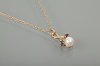 Lot 1199 - NINE CARAT GOLD PEARL AND SAPPHIRE PENDANT the...