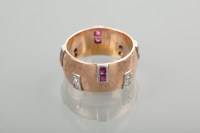 Lot 1218 - UNUSUAL RUBY AND DIAMOND SET WEDDING BAND set...