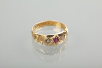 Lot 1226 - VICTORIAN DIAMOND AND RUBY RING the star set...