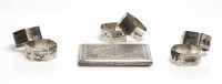 Lot 454 - SIX PERSIAN NIELLO SILVER NAPKIN RINGS with...