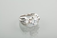 Lot 1273 - WHITE GEM SET SOLITAIRE RING the white gem...