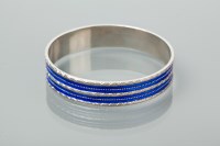 Lot 1306 - SCANDINAVIAN ENAMELLED SILVER BANGLE with blue...