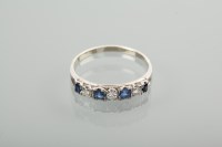 Lot 1312 - SAPPHIRE AND DIAMOND HALF ETERNITY RING set...