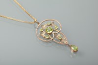 Lot 1314 - EDWARDIAN PERIDOT PENDANT set with brilliant...