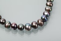 Lot 1343 - BLACK FRESHWATER PEARL NECKLACE with large...