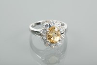 Lot 1357 - CITRINE AND WHITE SAPPHIRE CLUSTER RING the...