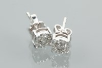 Lot 1391 - PAIR OF DIAMOND STUD EARRINGS the diamonds...