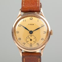 Lot 1045 - GENTLEMAN'S NINE CARAT GOLD TIMOR WRIST WATCH...