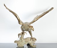 Lot 404 - ANTIQUE BRASS SCULPTURE OF AN EAGLE landing on...