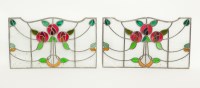 Lot 524 - PAIR OF ART NOUVEAU STAINED AND LEADED GLASS...