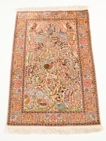 Lot 544 - PERSIAN PRAYER RUG with tree-of-life design in...