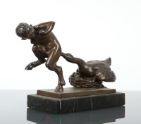 Lot 593 - CONTINENTAL BRONZE FIGURE OF A HORNED BOY AND...