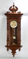 Lot 286 - EARLY 20TH-CENTURY OAK WALL CLOCK with carved...