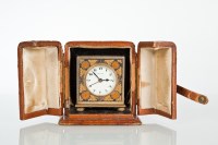 Lot 294 - ZENITH TRAVEL CLOCK with japanned case, in...